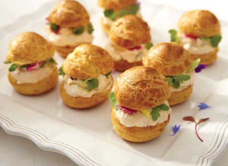 Savory Cream Cheese Profiteroles -- stuffed with a cream cheese, sundried tomato pesto, herb and shallot filling. Profiteroles Recipe, Holiday Party Appetizers, Sundried Tomato Pesto, Food Network Canada, Tea Sandwiches, Eclairs, Appetizer Dips, Appetizers For Party, Food Network