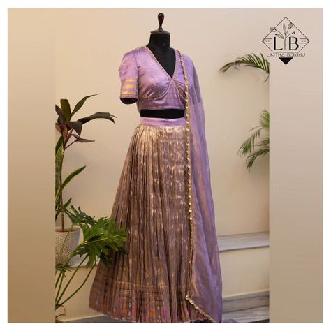 Discover our versatile Kanchi Pattu half saree, complemented by a delicately hand-embroidered blouse showing the craftsmanship of our artisans in yet another different colour! Perfect for those who blend heritage with contemporary elegance. 🌼 Customize your Pattu half saree at Label Likitha Bommu. ✨ ☎️ +91 72 77777 456 📍 223, Prashasan Nagar, Jubilee Hills #kanchi #kanchipuram #kanchipattusaree #kanchipattuhalfsaree #handloom #lehenga #southindianlehenga #southindianweddings #southindianb... Lavender Half Saree Pattu, Lavender Colour Half Saree, Langa Dhavani Blouse Designs, Kanchi Pattu Lehenga Half Saree, Half Saree Pleats, Lehnga Dress, Hand Work Blouse, South Indian Weddings, Hand Work Blouse Design