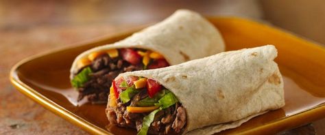 Enjoy these hearty beef burritos for dinner - ready in 30 minutes. Perfect if you love Mexican cuisine. Mexican Burritos, Beef Burrito Recipe, Steak Wraps, Tacos Mexicanos, Burrito Recipe, Fluffy Rice, Meal Prep Guide, Chicken Burrito, Food Inc