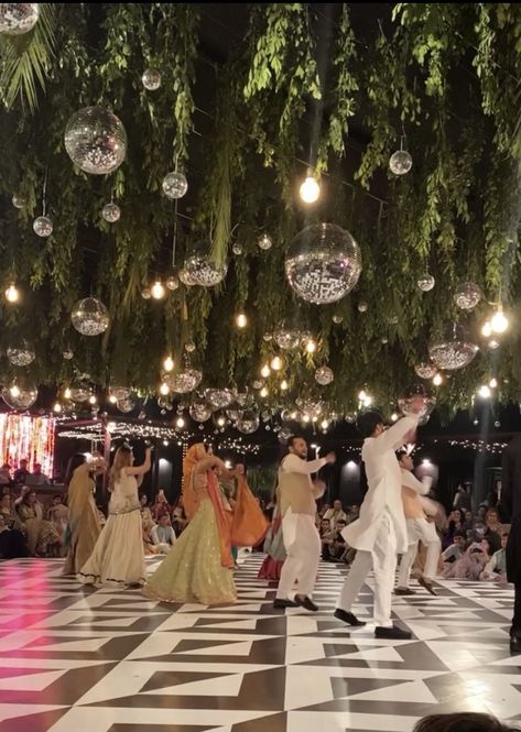 wedding season Jungle Disco Wedding Decor, Indian Reception Centerpieces, Sangeet Decoration Outdoor, Stage Reception Decor, Backyard Sangeet, Sangeet Decor Ideas Indian Weddings, Desi Wedding Decorations, Indian Wedding Sangeet Decor, Sangeet Wedding Decor