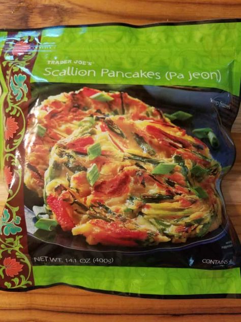 Trader Joe's Scallion Pancakes (Pa Jeon) is frozen and easy to make. My full review includes pictures, thoughts, product and nutritional information. Jeon Recipe, Trader Joes Appetizers, Scallion Pancake Recipe, Veggie Pancakes, Vegan Tikka Masala, Best Frozen Meals, Fresh Appetizers, Easy To Cook Meals, Scallion Pancakes