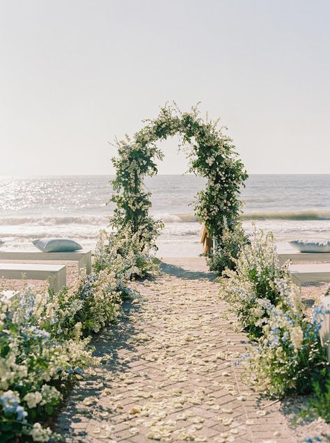 Looking for the perfect beach wedding ceremony?  Look no further than this english garden wedding filled with tropical details! Photography: Kati Rosado (http://www.katirosado.com) Garden Beach Wedding Ideas, Flower Arch Beach Wedding, Half Indoor Half Outdoor Wedding, Wedding Arch On Beach, Wedding Ceremony On The Beach, Tropical Beach Wedding Arch, Beach Flower Wedding, Beach Tropical Wedding, Beach Wedding Mexico