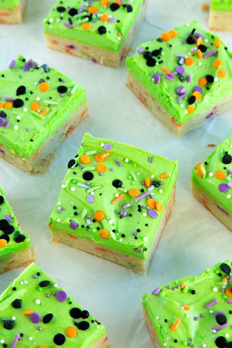 Halloween Sugar Cookie Bars Halloween Cookie Bars Recipes, Sugar Cookie Recipe Halloween, Halloween Cake Mix Cookie Bars, Halloween Oreo Cake Bars, Pillsbury Halloween Cookie Brownies, Halloween Cookie Bars, Slice And Bake Halloween Cookies, Frosted Sugar Cookie Bars, Halloween Blondies