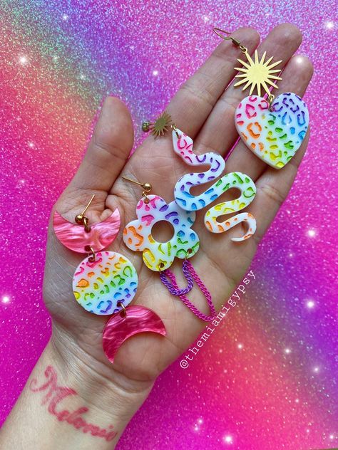 This listing is for ONE Pair of Rainbow Leopard Earrings. 4 options available. ( Please choose option from drop down menu.) - Heart (approx. 2.75in) - Snake (approx. 3in) - Daisy (approx. 3in) - Moon Phase (approx. 2.75 Subscribe to my Newsletter to be the first to know about new items and get exclusive offers! Acrylic Earrings Laser Cut, Leopard Earrings, Witch Earrings, Dream Fashion, Earrings Acrylic, Laser Cut Earrings, Cut Earrings, Rainbow Leopard, Polymer Earrings