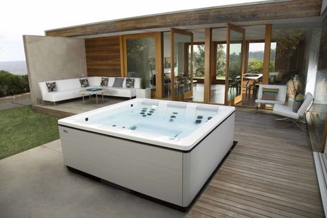 We’ve been living in Los Angeles for 10 years, and at the top of the bucket list for our home has always been a hot tub. Bullfrog Spas modern hot tub design is a technological wonder. | Charles & Hudson | #hottubs #patio #bullfrogspas Modern Hot Tubs, Custom Hot Tubs, Hot Tub Steps, Hot Tub Landscaping, Luxury Hot Tubs, Hot Tub Designs, Hot Tub Patio, Portable Hot Tub, Modern Spa