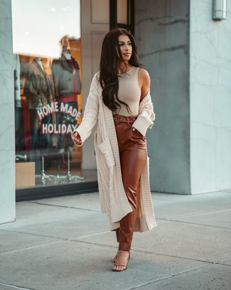 Yvetteg23: fall outfit, winter outfit, leather pants outfit, tan leather trousers, camel leather pants , taupe bodysuit, longline cream duster cardigan outfit. Neutral outfit #neutralstyle #leatherpants #outfit #instagramphotoshoot #bloggerpose #poseideas #streetstyle #aesthetic #fallfashion #winterfashionoutfits #ootd #outfit #style #cardigan #leather #trousers #holidayoutfit Tan Cardigan Outfit, Duster Cardigan Outfit, Cream Cardigan Outfit, Brown Leather Pants Outfit, Leather Trousers Outfit, Winter Cardigan Outfit, Tan Outfit, Dress Pants Outfits, Brown Leather Pants