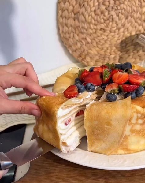 desserts on Instagram: "Summer pancake cake🍰 🎥 by @monakhovan_ Follow @dessertribe for daily desserts🍫 WHAT YOU NEED: ▫️Egg 4 pcs ▫️Milk 800 ml ▫️Flour 10 tbsp ▫️Sugar, salt to taste ▫️Vegetable oil Cream: ▫️Curd cheese 500 gr ▫️Cream 250 ml ▫️Condensed milk 250 gr ▫️Strawberries or other berries Cooking like in the video. It’s convenient that you don’t need to bake anything, just fry the pancakes and grease with cream, you can use any berries and fruits." Pancake Cake, Fruit, Cake, On Instagram, Instagram