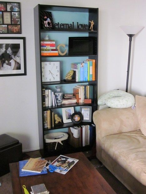 Paint interior of black bookcases in family room with wall color to brighten... Gonna do this!! Paint Bookcase, Easy Bookshelf, Black Bookcases, Brighten Room, Black Bookcase, Ikea Billy Bookcase, Ikea Billy, Yellow Room, Billy Bookcase