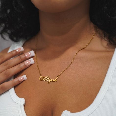 Keep it classic. ⊹ ࣪ ˖₊˚⊹⋆ Design your custom name necklace today! Link in bio. #NameNecklace #CustomJewelry #OGJewelry Necklace Names Ideas, Name Plate Necklace Aesthetic, Name Necklace Aesthetic, 2025 Rebrand, Young N Turnt, Name Plate Necklace, Silver Name Necklace, Necklace Aesthetic, Nameplate Necklace