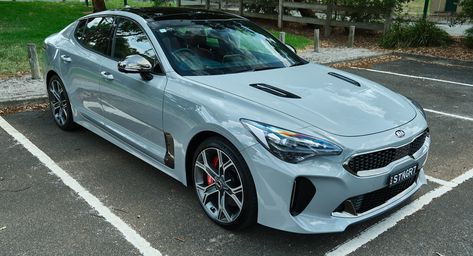 The 2020 Kia Stinger GT is headlined by a 3.3-liter twin-turbo V6 and a bi-modal exhaust. Kia Sports Car, Kia Stinger Gt, Kia Stinger, Kia Picanto, Kia Rio, Sports Sedan, Stinger, Kia Sportage, Future Car