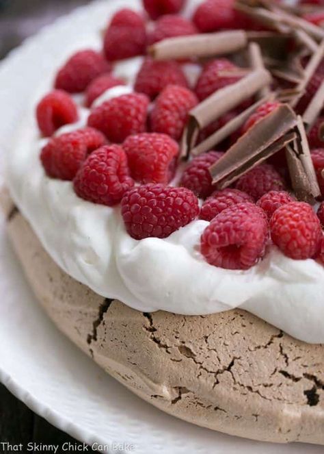 Chocolate Raspberry Pavlova - A sublime dessert with a chocolate meringue topped with berries and cream Pavlova Raspberry, Raspberry Pavlova, Blueberry Pie Recipe, Chocolate Pavlova, Pavlova Dessert, Meringue Pavlova, Meringue Desserts, Berries And Cream, Raspberry Desserts