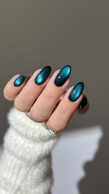 Aistė Haas on Instagram: "🧊 currently defrosting my holiday nail polish collection ❄️  *all the products used are linked on my amzn in the bio  _____ *affiliate #winternails #glitternails #marblenails #bluenails #nails #nailinspo #nailtutorials #diynails #cateyenails blue green teal nails aura ombre glass nails, almond nails, simple classy  velvet fall nails" Nye 2025 Nails, Teal Holiday Nails, Blue And Green Aura Nails, Teal Aura Nails, Jewel Toned Nails, Blue And Teal Nails, Teal Cat Eye Nails, Dark Teal Nail Ideas, Green Teal Nails