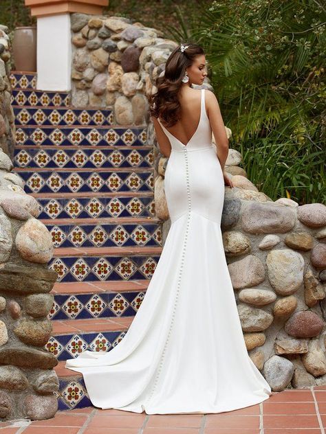 Have all eyes on you the moment you slip into Moonlight Tango T933. This sultry bridal gown includes a deep v-back with buttons along the zipper to the end of the train, adding a glamorous touch. For a clean finish, this beauty includes a short sweep train, a simple and beautiful touch. #weddingdress #mermaidweddingdress #crepeweddingdress #weddinggown #simpleweddingdress Square Neck Wedding Dress, Moonlight Bridal, Wedding Dress Buttons, Wedding Dresses Mermaid, Crepe Wedding Dress, Bridal Gallery, Bridal Ideas, Stella York, Back Wedding Dress