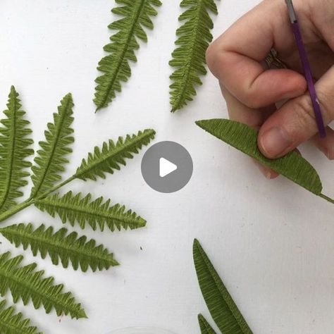 Clare • Paper Wedding Flowers • Paper Florist on Instagram: "MOST DIFFICULT TO MAKE: Day 29 of #marchmeetthemaker // Maybe not so difficult to make but they definitely take time, patience and tiny scissors ✂️🌿 These paper ferns are forming part of the foliage for a beautiful bridal bouquet which I’ve been commissioned to recreate from paper as a first wedding anniversary gift. I’m so pleased with how it’s developing, there will be a few more sneak peeks coming soon 💚  #heytheremaker #paperfern #inspiredbynature  #paperlicious" Paper Flower Bridal Bouquet, Paper Fern Diy, Crepe Leaves, Crepe Paper Leaves, Paper Plants Diy, Paper Fern, Paper Greenery, Paper Wedding Flowers, Paper Foliage