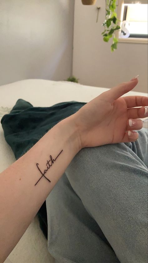 Faith Meaning Tattoo, Religious Tattoos For Women, Faith Cross Tattoos, Tattoos For Women Small Meaningful, Wrist Tattoos Words, Side Hand Tattoos, Meaningful Wrist Tattoos, Tiny Wrist Tattoos, Cursive Tattoos