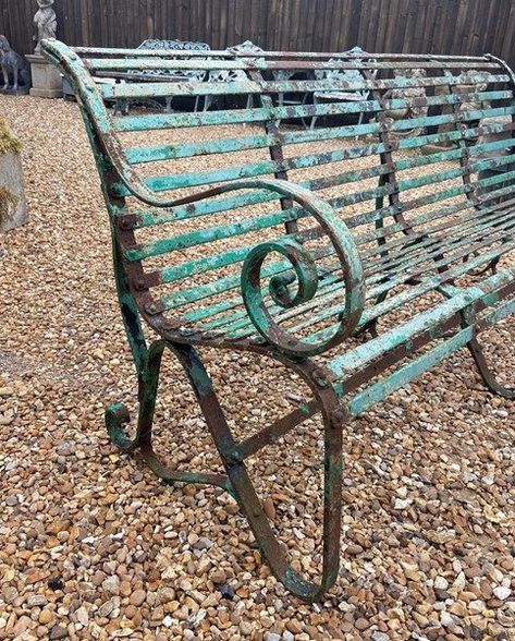 A beautiful original strap work bench in its original paint work. This style bench is one of the most comfortable benches to sit on and will enhance any garden be it period or a modern setting. To see more of our garden antiques please do visit our website. Iron Garden Furniture, Planter Pedestal, Wrought Iron Bench, Garden Antiques, Metal Garden Furniture, Garden Statuary, Iron Straps, Curved Bench, Iron Bench