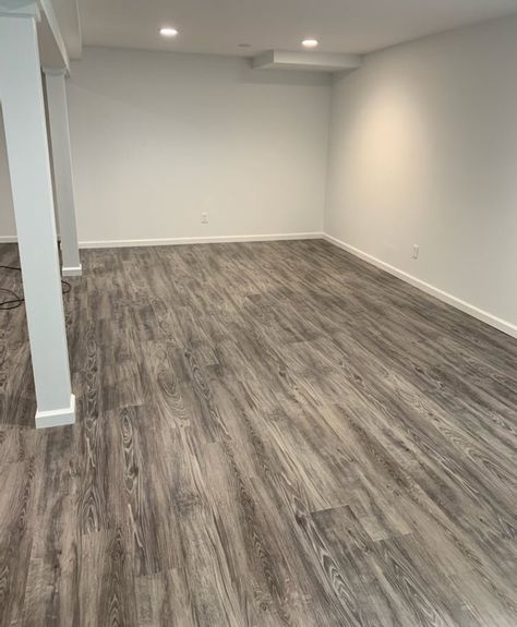 LVT vs. Carpet: What’s Better for a Basement? Basement Lvt Flooring, Basement Remodel Vinyl Flooring, Vinyl Flooring Basement Ideas, Luxury Vinyl Plank Flooring Basement, Carpet Basement Ideas, Basement Carpet Tiles, Basement With Carpet, Carpet In Basement, Basement Carpet Ideas