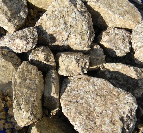 Platinum Blonde 1-1/2" screened rock. This Central California quarried granite rock appears to be loaded with silver which are constantly sparkling as the sunlight moves along the surfaces of the gravel or rock. A rich blend of white and granite colors and the silver pieces create fantastic light colored gravel or rock material. Granite Rock, Granite Colors, Our Planet Earth, Central California, Rock A, Platinum Blonde, Silver Pieces, Planet Earth, Rocky