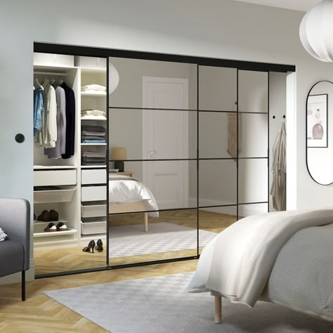 SKYTTA / PAX walk-in wardrobe with sliding doors, black/Auli mirror glass, 1085/8x63x801/2" - IKEA Ikea Pax Auli Wardrobe, Ikea Mirror Hack Closet, Dressing Sliding Doors, Modern Mirror Closet Doors, Glass Wardrobe Design Mirror Door, Ikea Mirror Door, Walk In Closet Door, Dressing Pax, Dressing Ikea