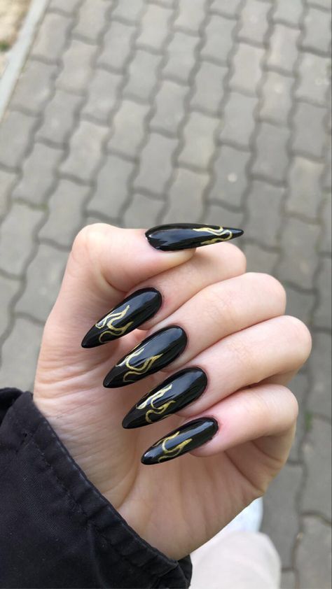 long black sharp nails with flames Black And Gold Flame Nails, Gold Flame Nails, Black Shiny Nails, Nails With Flames, Megan Nails, Black Nails Acrylic, Lightning Nails, Mom Nails, Black Gold Nails