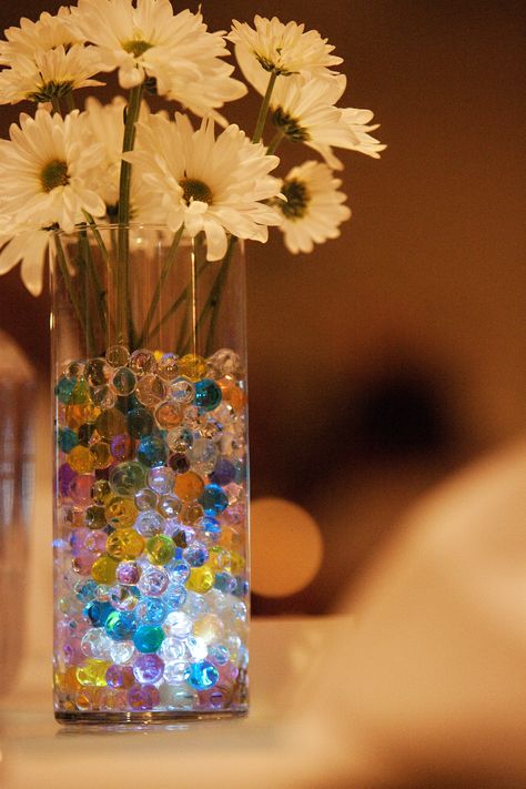 Water beads with submersable lights as centerpieces - Inexpensive, fun and very pretty! Candyland Wedding, Water Beads Centerpiece, 00s Party, Ninth Birthday, Cork Wedding, Mermaid Bride, Adventure Party, Gel Beads, String Lights Wedding