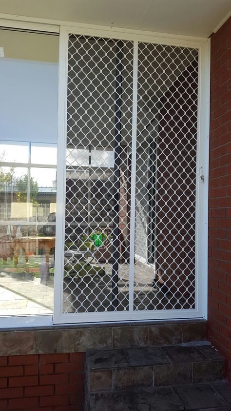 Diamond grill sliding security door www.flyscreensaustralia.com.au Sliding Grill, Sliding Patio Screen Door, Beautiful Houses Inside, Safety Doors, Archways In Homes, Metal Screen Doors, Window Seat Ideas, Patio Screen Door, Window Grills