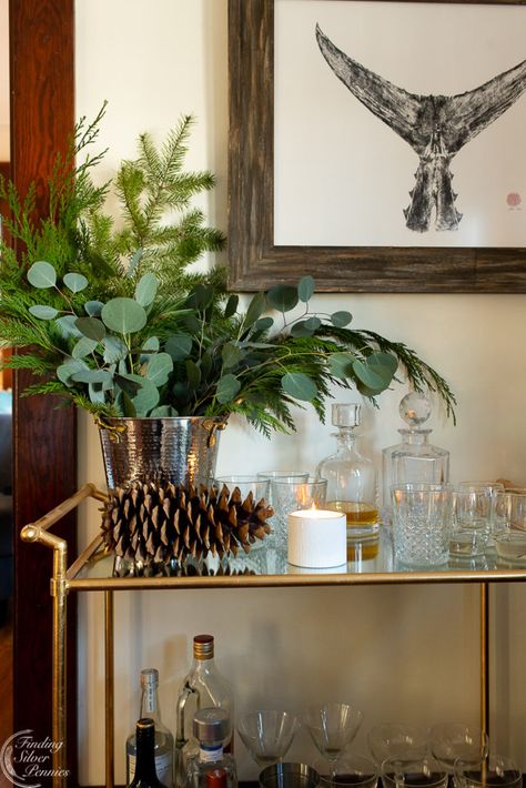 Festive Christmas Bar Cart | Finding Silver Pennies #homedecor #christmasinspiration #newengland #scituate #interiors #christmasideas Christmas Bar Styling, Bar Cart Holiday Decor, Christmas Bar Set Up, Bar Cart Christmas Decor, Christmas Bar Decor, Holiday Bar Cart Christmas, Christmas Bar Cart Styling, Christmas Bar Decorations, Giant Pine Cones