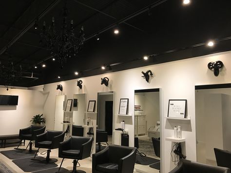 Salon With Black Ceiling, Black Ceiling Hair Salon, Hair Salon Decor Black And White, Salons With Black Ceilings, Black Ceiling Salon, Black And White Nail Salon Decor, Black And Tan Salon Decor, Black And White Salon Ideas, Salon Decor Black And White