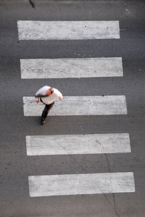 Businessman on crosswalk. Motion blurred overhead view of a businessman in shirt and tie hurriedly crossing the street at a pedestrian crossing royalty free stock photo Crossing The Street Aesthetic, Crossing The Street, Pedestrian Crossing, Lamp Inspiration, Street Pictures, Shirt And Tie, Graduation Picture, Graduation Picture Poses, Cross Roads