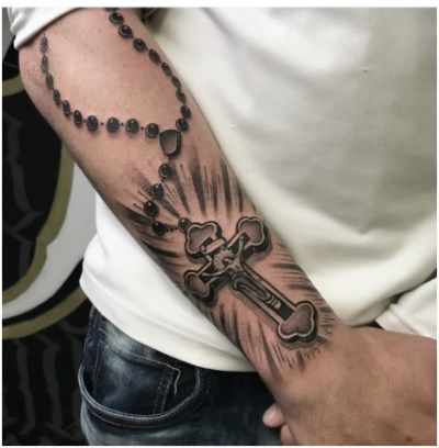 rosary tattoo design on forearm – EntertainmentMesh Tattoo Ideas For Men Beginner, Rosario Tattoo Design, Men's Side Neck Tattoos, Oscar Tattoo, Rosary Tattoo Arm, Rosary Tattoo On Hand, Rosary Bead Tattoo, Crucifix Tattoo, Hockey Tattoo