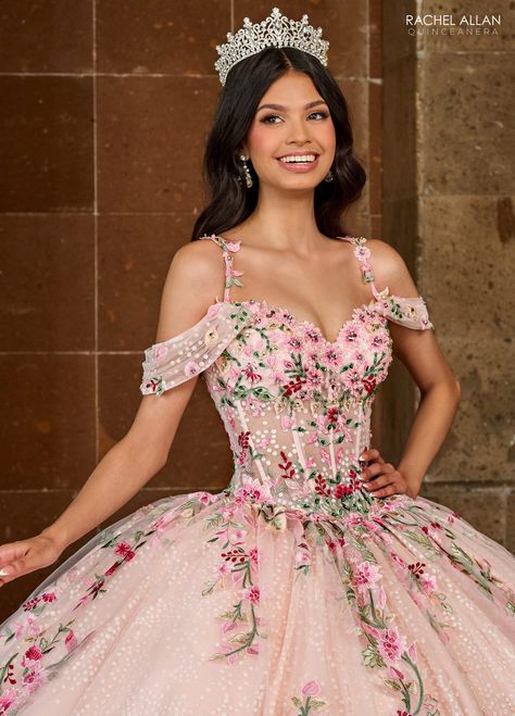 Let your princess look and feel like royalty for her Quinceanera with this glitter tulleballgown! Sparkle and shine in this glamorous gown with shimmery applique andbeading, and a stylish, strapless neckline that is both flattering and feminine. Theperfect way to add a touch of old-fashioned elegance and sophistication to the day,the detachable cape train completes this look for a classic and timeless vibe. Cape issold separately QS2185. TULLE, GLITTER TULLE, APPLIQUE, BEADING Pink Flower Quince Dress, Flower Quinceanera Dresses, Embroidered Quinceanera Dress, Floral Quinceanera Dress, Floral Quince, Mexican Quinceanera Dresses, Belle Cosplay, Tulle Ballgown, Detachable Cape