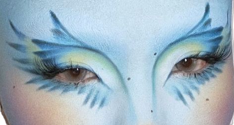 Dinosaur Eyeliner, Bird Makeup Look, Beta Fish Costume, Blue Bird Makeup, Moth Inspired Makeup, Bird Makeup Halloween, Bird Inspired Makeup, Bird Makeup Ideas, Dr Seuss Makeup