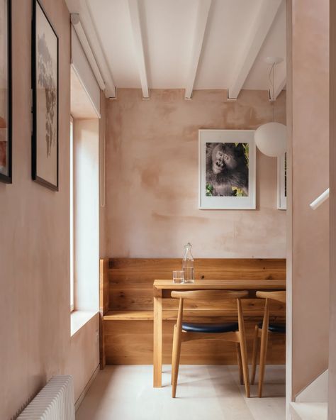 An Ex-Council House in London Gets a Rose-Colored Makeover | Architectural Digest Council House Renovation, White Wash Oak Floor, Pink Kitchen Walls, White Washed Floors, Pink Shelves, Painted Bookshelves, Council House, White Washed Oak, Kitchen Wall Colors