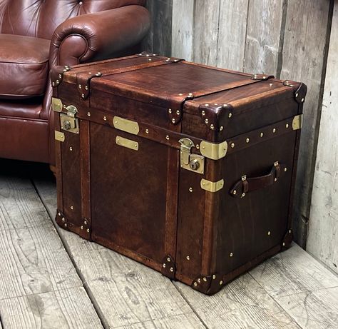 Handmade luxury leather campaign style travel trunk chest. In a hand dyed leather luxury chestnut brown finish with brass cast fittings. Beautiful trunk table with storage and superb side table end table piece. Hand crafted using the finest leather and all hand crafted using traditional leather craft skills. A beautiful room decor home ware piece. Beautiful Room Decor, Trunk Chest, Trunk Table, Home Ware, Painted Trunk, Leather Trunk, Travel Trunk, Antique Trunk, Pillow Inspiration