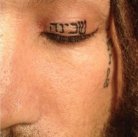 Korn Guitarist Brian 'Head' Welch Tattoos God in Hebrew on Eyelid; Apologizes to Mom Brian Head Welch, Tattoo Tv Shows, Head Welch, Hebrew Tattoo, Brian Head, Inked Magazine, Face Tattoos, Head Tattoos, Face Tattoo