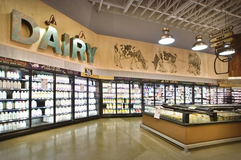 The dairy section features local and organic cheese options. It's increasingly important for grocery stores to differentiate merchandise. Grocery Store Design, Retail Solutions, Supermarket Design, Milk Shop, Shop Window Design, Store Design Interior, Lifestyle Store, Shop Plans, Store Interior