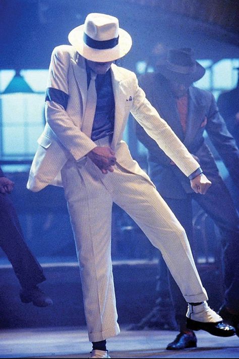 A still from the video clip for Smooth Criminal where Jackson wore patent black shoes with white spats. The shoes were specifically designed to enable his famous full body tilt. Michael Jackson Costume, Michael Jackson Outfits, Michael Jackson 1988, Michael Jackson Poster, Michael Jackson Dance, Sean Lennon, Michael Jackson Wallpaper, Jackson Bad, Michael Jackson Art