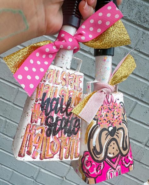 If I had to choose one order to represent my style/brand, it’d 1000% be this one! give me all the brights, neons, glitter, stars - if it looks chaotic & a bit too much, add a little more & thennnn we’re talking HG 🤩💖🧡🌟✨ #gamedaybell #gamebells #collegefootball #SEC #footballseason #footballsaturday #collegegirls #seniorgifts #smallartist #smallbusiness #localbusiness #localartist #meridianmagazine #etsyshop #etsyseller Painted Items To Sell, Cowbell Painting Ideas, Football Game Student Section, Painted Cowbell, Msu Dorm Room, Doorm Room Ideas, Senior Signs, Msu Dorm, Doorm Room