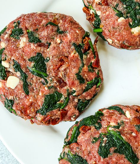 Spinach and Feta Greek Burgers | Heinen's Grocery Store Spinach And Feta Burgers, Spinach Feta Burgers Beef, Feta Stuffed Burgers, Greek Burgers, Cucumber Hummus, Ground Beef And Spinach, Recipes Using Hamburger, Spinach Burgers, Greek Burger