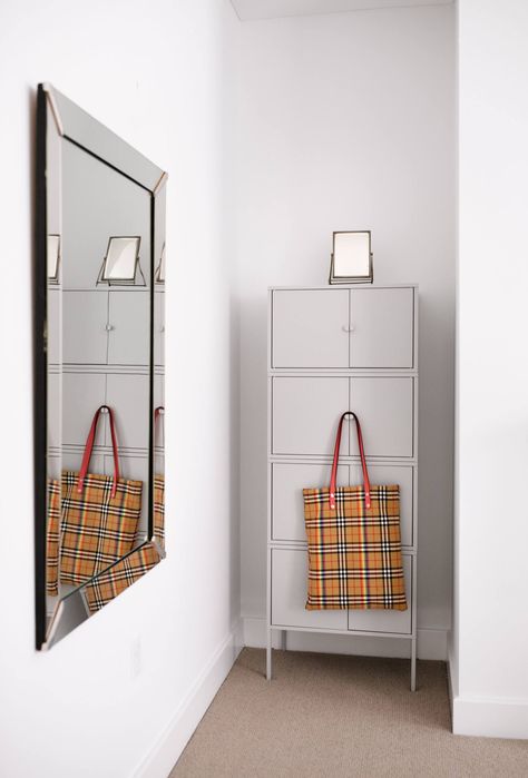 A mesh Burberry bag provides a dash of color. Ikea Storage Furniture, Ikea Storage Units, Ikea Hack Storage, Apartment Storage, Expensive Furniture, Home Storage Solutions, Ikea Storage, Retro Furniture, Room Remodeling