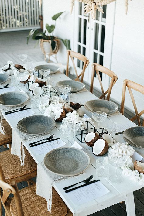 Summer Breeze Dinner Party with Coconuts and Coral #entertaining #tropicalweddingideas #coconuts #tablescape #outdoorparties Boho Porch, Tafel Decor, Dinner Party Table, Tablescape Inspiration, Dinner Table Setting, Table Inspiration, Table Set Up, Beaded Chandelier, Table Arrangements