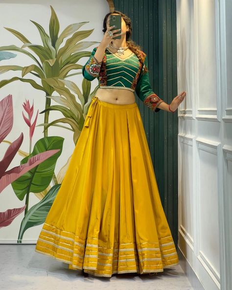 Beautiful Chaniya Choli From Our Ethnic Collection. #navratri #clothing #saree #outfit #jewellery #ahmedabad #gujarat #garba #nyasastore #india Simple Garba Outfits, Lengha Blouse, Saree Outfit, Lengha Blouse Designs, Garba Outfit, Model Blouse Designs, Blouse Designs High Neck, Navratri Dress, Lehenga Designs Simple