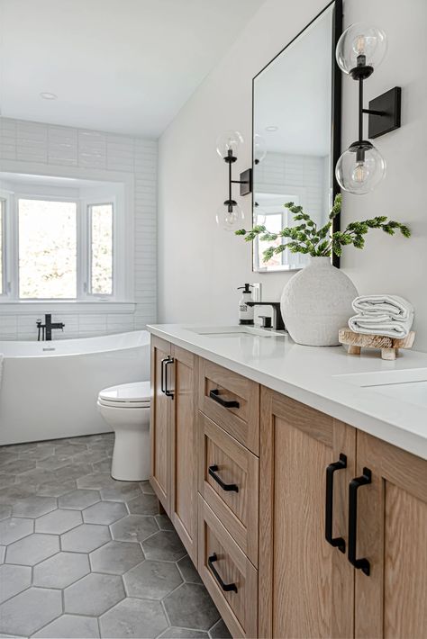 Master Bath Modern Farmhouse Style, Bathroom Layout Double Vanity, Bathroom Inspiration Black Hardware, Modern Bathroom Remodel Ideas Elegant, Bathroom Design Themes, Master Bath Tile Inspiration, Bathroom Remodel Wood Cabinets, Wood Bathroom Vanity With Wood Floor, Modern Classic Bathroom Ideas