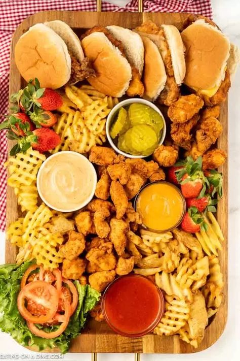 Chick Fil A Charcuterie Board - Eating on a Dime Chick Fil A Board, Fries And Chicken, Charcuterie Party, Eating On A Dime, Brunch Spread, Friendsgiving Dinner, A Charcuterie Board, Chicken Sandwiches, Charcuterie Inspiration