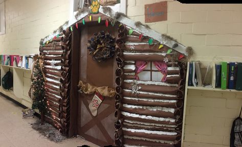 Swamp log cabin door decoration.  Art classes worked tirelessly for two weeks.  I think they did an amazing job! Log Cabin Door Decorating Contest, Log Cabin Classroom Door, Cabin Classroom Door, Christmas Office Desk, Log Cabin Door, Ski Lodge Christmas Decor, Ski Lodge Christmas, Cabin Door Decorations, Santas Grotto