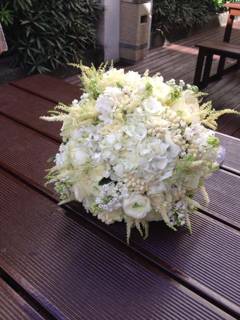 An all white flowers using ranunculus with sampaguita and hydrangea, the wedding is a union of two different culture, the guy is french and the bride is a filipina, mixing their national flowers in her bridal bouquet (hydrangea and sampaguita) is a nice idea.this bouquet name is JUDY ANN. www.sergeigonia.com Sampaguita Wedding Bouquet, Sampaguita Bouquet, Philippine Flowers, Bridal Bouquet Hydrangea, Flowers At Wedding, All White Flowers, Bouquet Hydrangea, Hydrangea Bridal Bouquet, Philippine Wedding