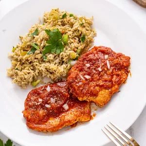 Pork Chops in Tomato Sauce Recipe: How to Make It Pork Chops In Tomato Sauce, Tomato Pork Chops, Pork Loin Chops, Tomato Sauce Recipe, Pork Chop, Easy Dishes, Chopped Tomatoes, Pork Loin, Delicious Dinner