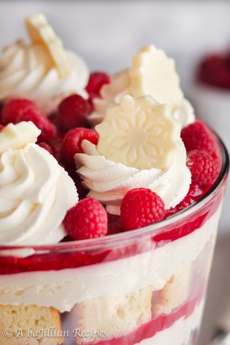 Raspberry Cheesecake Trifle, White Chocolate Raspberry Trifle, Cheesecake Trifle Recipes, Almond Trifle, Chocolate Raspberry Trifle, Chocolate Cheesecake Mousse, Fresh Raspberry Sauce, White Chocolate Snowflakes, Raspberry Trifle