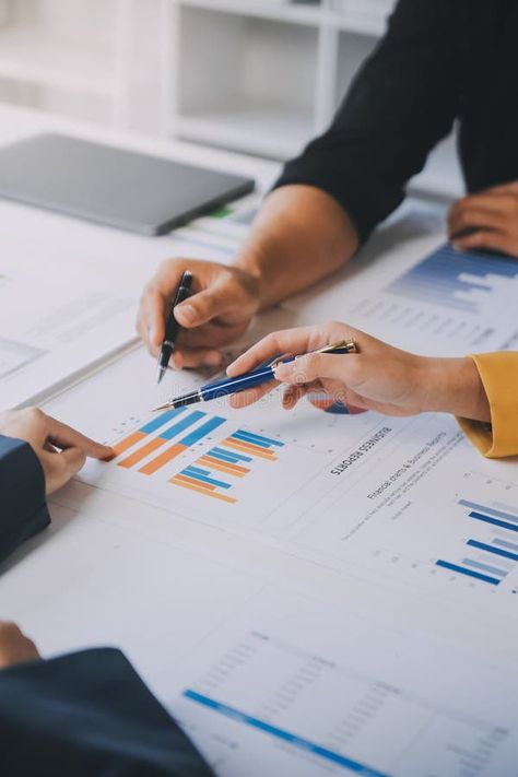 Financial analysts analyze business financial reports on a digital tablet planning investment project during a discussion at a stock image Financial Report, Financial Analyst, Digital Tablet, Financial Planning, Lawyer, Investment, A Photo, Dubai, Accounting