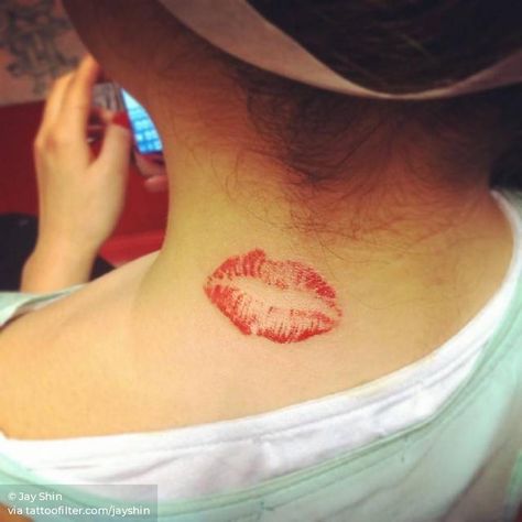 Kiss tattoo on the back of the neck. Kiss Mark Tattoo On Neck, Red Ink Tattoos For Women, Kiss Mark Tattoo, Kiss Tattoo On Neck, Kissing Tattoo, Kiss Tattoo, Simple Tattoo Ideas, Kiss Tattoos, Side Neck Tattoo